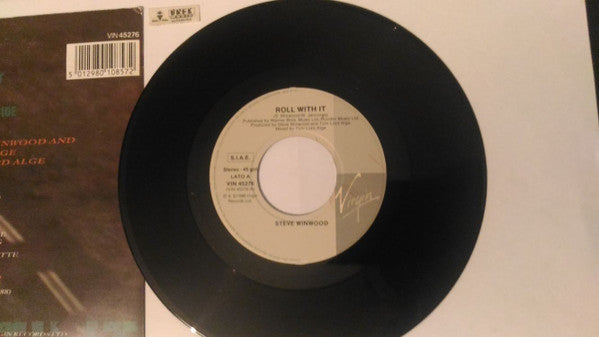 Steve Winwood : Roll With It (7", Single)