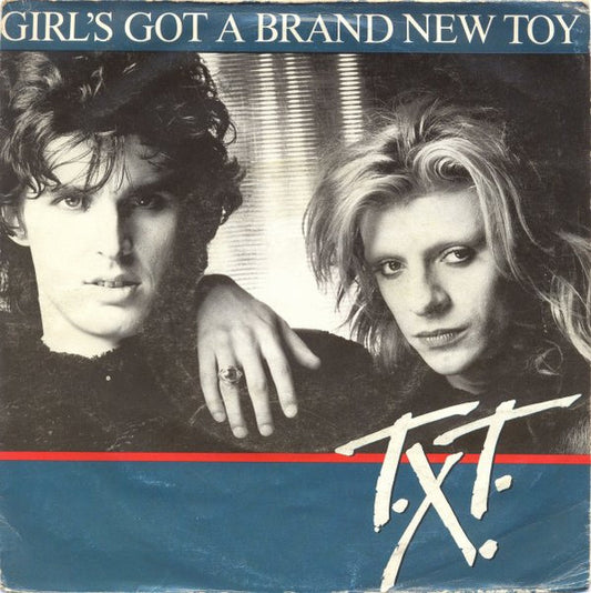 T.X.T. : Girl's Got A Brand New Toy (7")