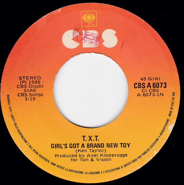 T.X.T. : Girl's Got A Brand New Toy (7")